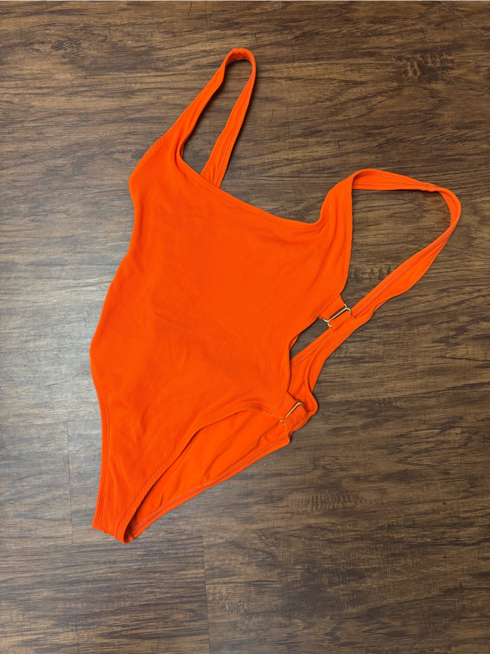 L Space Orange Ribbed One-Piece Swimsuit with gold hardware
